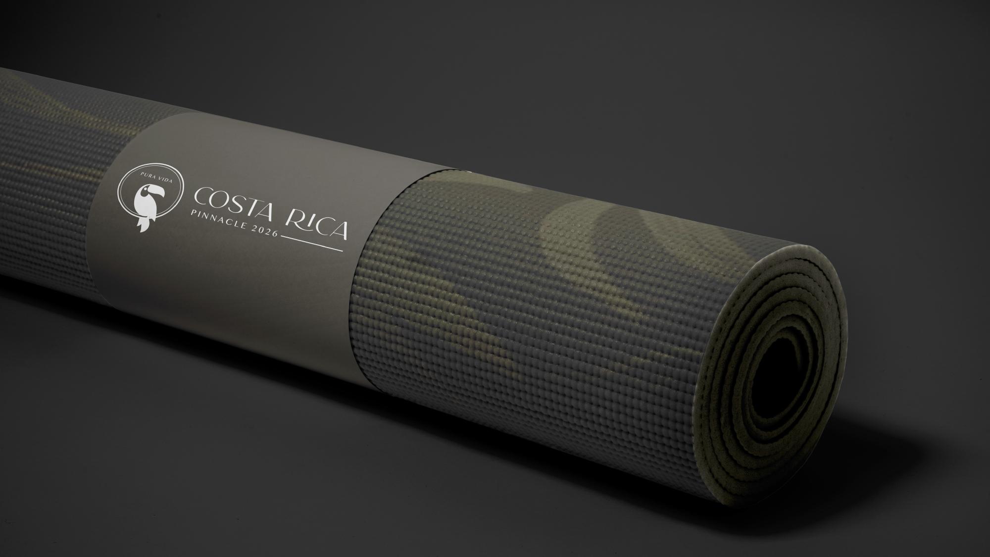 Yoga mat branded with Costa Rica Pinnacle 2026