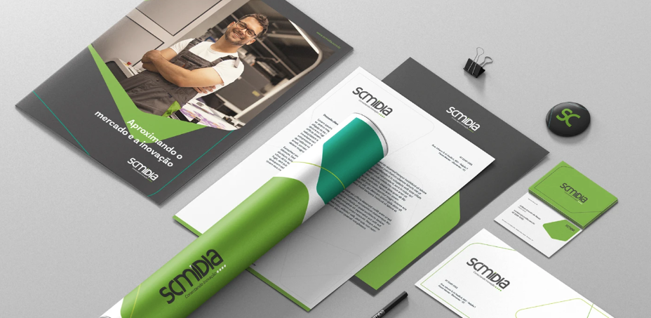 Sales kit with presentation folder, letterhead, document tube and lapel button